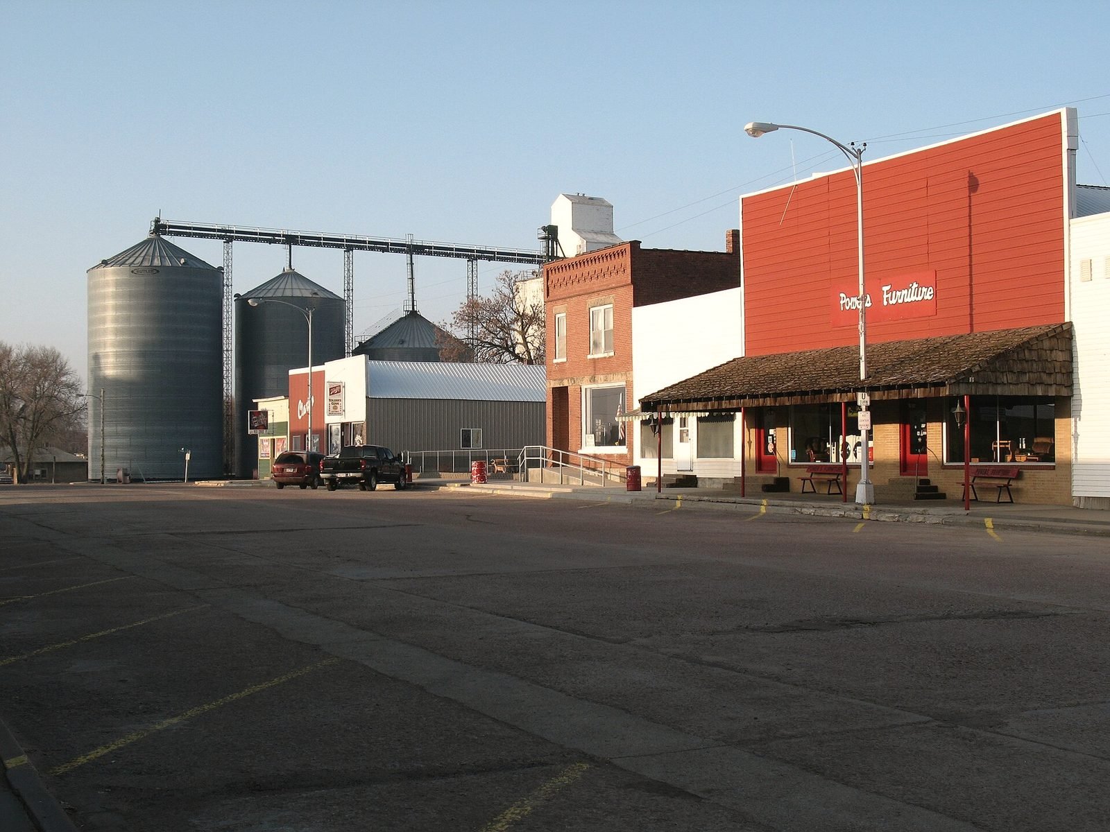 Main Street in Avon, South Dakota, with grain bins at the end of the street
