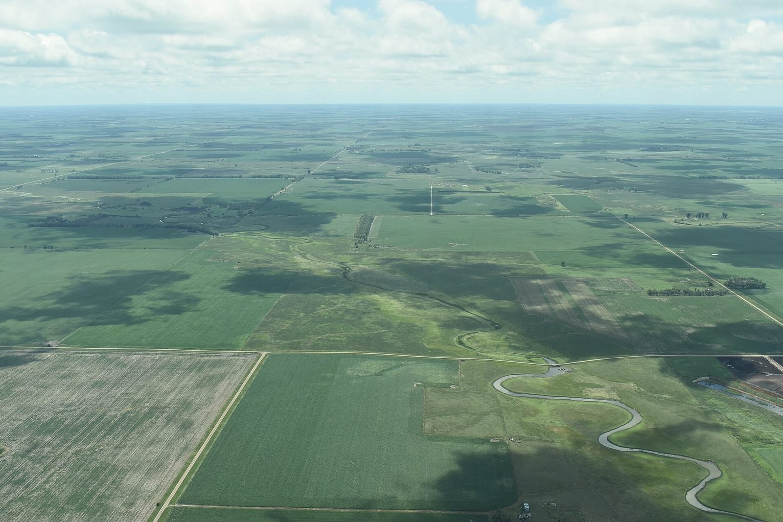 Aerial view of South Dakota farmland dotted with prairie pothole wetlands